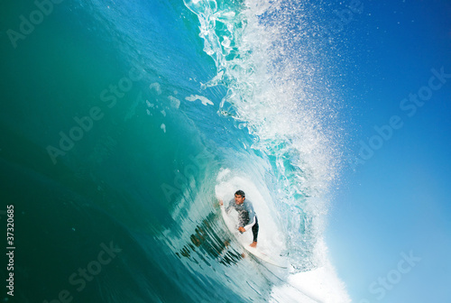 Photo: Surfer on Blue Ocean Wave Surfer on Blue Ocean Wave