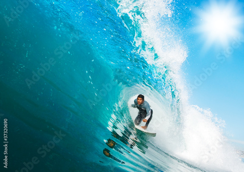 Photo: Surfer on Blue Ocean Wave Surfer on Blue Ocean Wave