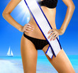 woman with tape of beauty contest