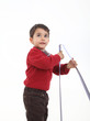 Photo: Young boy play with meter Young boy play with meter