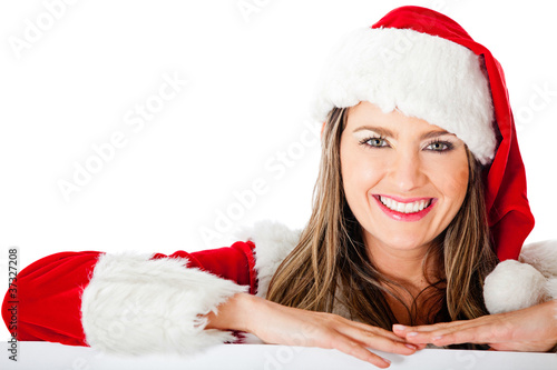 Photo: Mrs Claus leaning on a banner Mrs Claus leaning on a banner