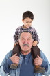 Photo: Child and grandfather playing Child and grandfather playing