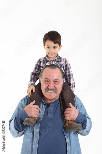 Photo: Child and grandfather playing Child and grandfather playing