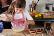 Mother and daughter baking at home Mother and daughter baking at home