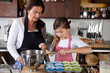 Mother and daughter baking at home Mother and daughter baking at home