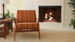 Chair next to fireplace in residential home Chair next to fireplace in residential home