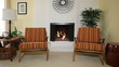 Chairs next to fireplace in residential home Chairs next to fireplace in residential home