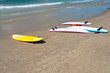 Surf boards on a  sandy beach