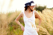 brunette girl in a hat