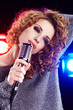 Rock star.Sexy Girl singing in retro mic Rock star.Sexy Girl singing in retro mic