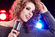 Rock star.Sexy Girl singing in retro mic Rock star.Sexy Girl singing in retro mic