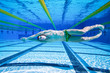 Swimmer in the Pool floating Underwater
