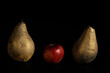 concept with red apple and golden pears