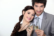 a couple toasting sparkling wine glasses