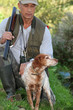 a hunter and his dog