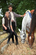 Image : Young couple out with horses