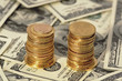 gold coins on the dollars backgrond gold coins on the dollars backgrond