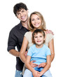 Photo: Happy young family with child - isolated Happy young family with child - isolated