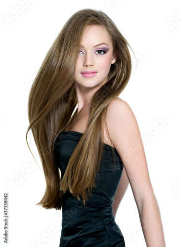 Photo: Beautiful teen girl with long straight hair Beautiful teen girl with long straight hair