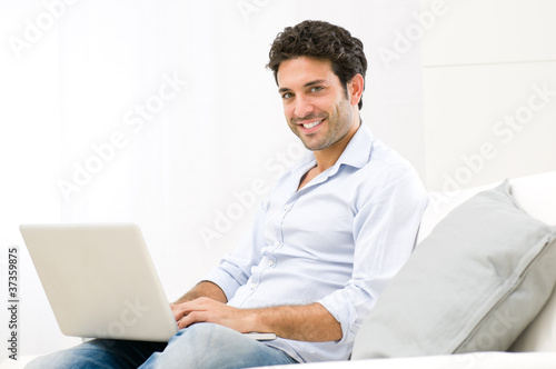 Photo: Relaxing at laptop Relaxing at laptop