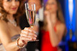 People with champagne in a bar