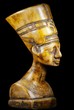 bust of Queen Nefertiti on black background