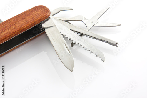 Photo: wood pocket knife in isolated white wood pocket knife in isolated white