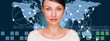 A business woman is using the internet. A map of the Earth with