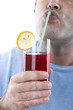 drinking a cocktail