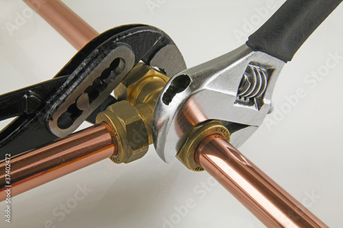 Photo: wrenches on pipework wrenches on pipework
