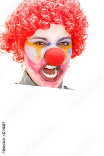 Photo: Angry Clown Holding Blank Sign Angry Clown Holding Blank Sign