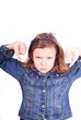 Girl holding her thumbs down