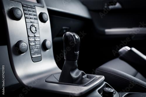 Photo: Modern car interior (shallow DOF - selective focus; color toned Modern car interior (shallow DOF - selective focus; color toned