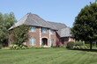 Brick home with arched entry