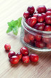 Photo: Cranberries in a glass jar, closeup shot Cranberries in a glass jar, closeup shot
