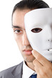 Industrial espionage concept with masked businessman