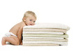 Photo: Baby girl resting head on towels Baby girl resting head on towels