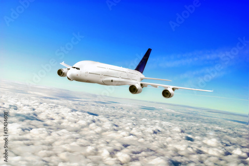 Photo: Modern airplane in the sky near Airport. Modern airplane in the sky near Airport.