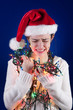 Photo: Panicked girl with Christmas lights Panicked girl with Christmas lights