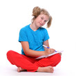 Cute schoolgirl with book.