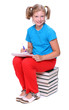 Cute schoolgirl with book.