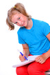 Cute schoolgirl with book.