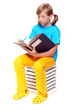 Cute schoolgirl with book.