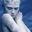 Portrait of a beautiful girl in the frost on his face