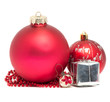 Three Christmas balls with red beads and little gift