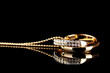 Pendant in form of rings with gem on black Pendant in form of rings with gem on black