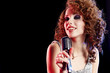 Portrait of a glamorous girl with mike singing song Portrait of a glamorous girl with mike singing song