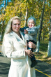 The young woman with the son on walk