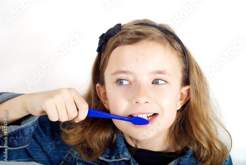 Photo: Girl Brushing Teeth Girl Brushing Teeth