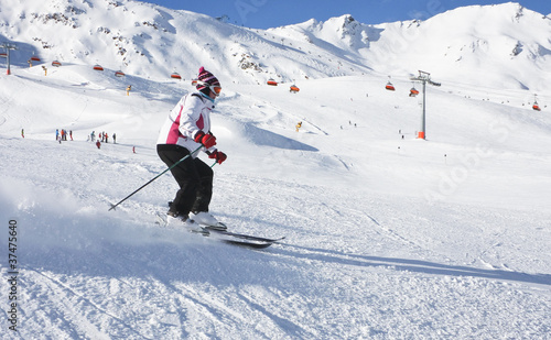 Photo: The woman is skiing at a ski resort Solden The woman is skiing at a ski resort Solden